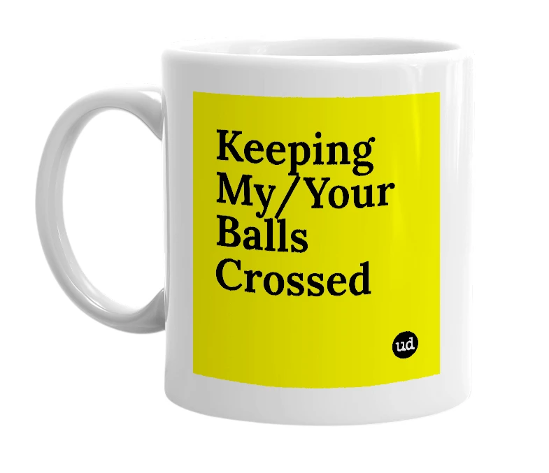 White mug with 'Keeping My/Your Balls Crossed' in bold black letters