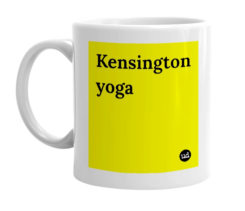 White mug with 'Kensington yoga' in bold black letters