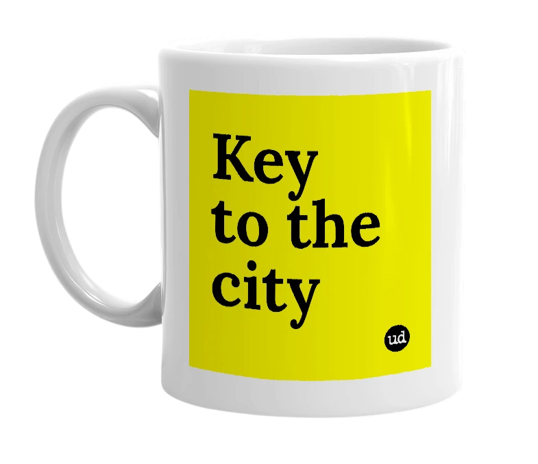 White mug with 'Key to the city' in bold black letters