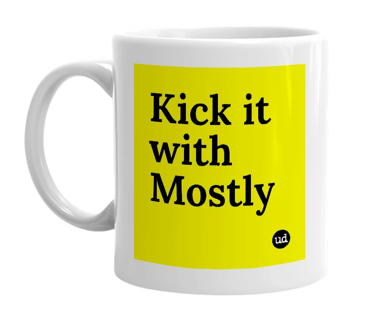 White mug with 'Kick it with Mostly' in bold black letters