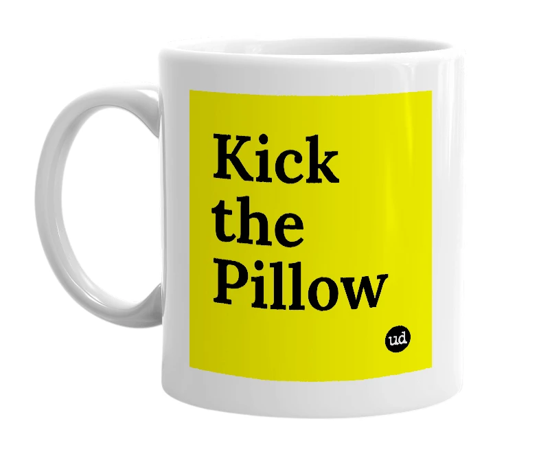 White mug with 'Kick the Pillow' in bold black letters