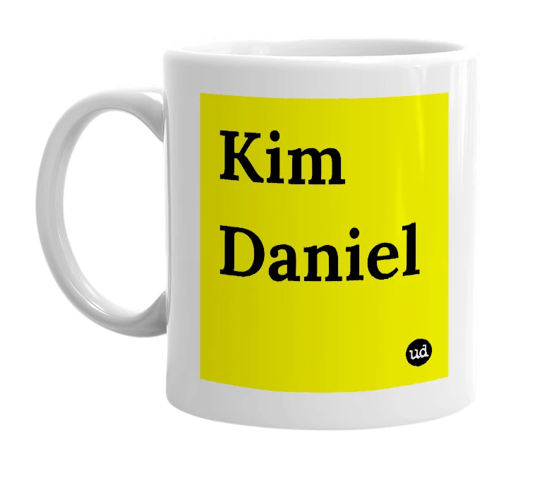 White mug with 'Kim Daniel' in bold black letters