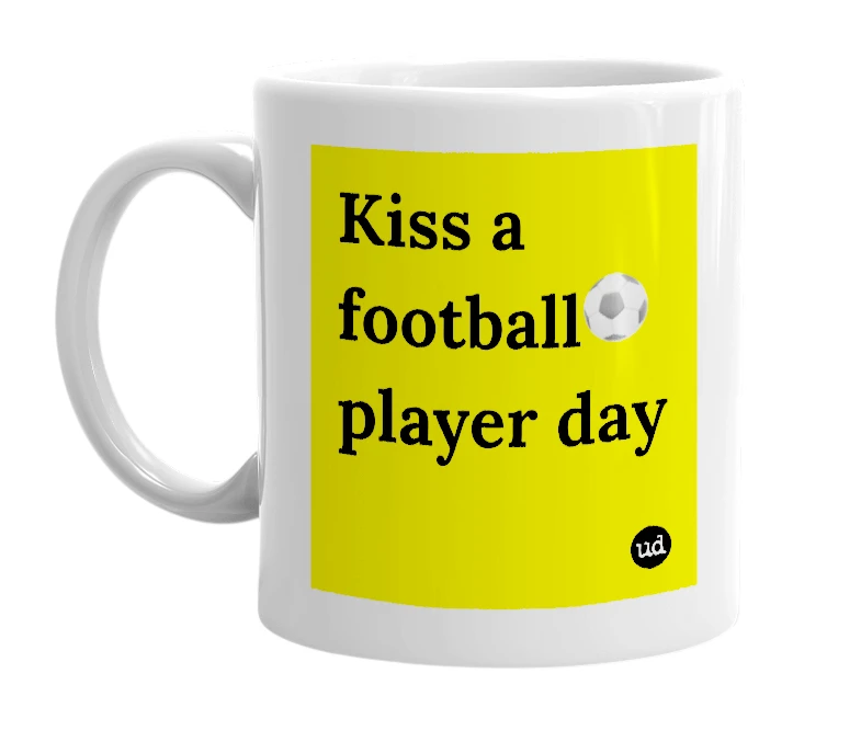 White mug with 'Kiss a football⚽️ player day' in bold black letters