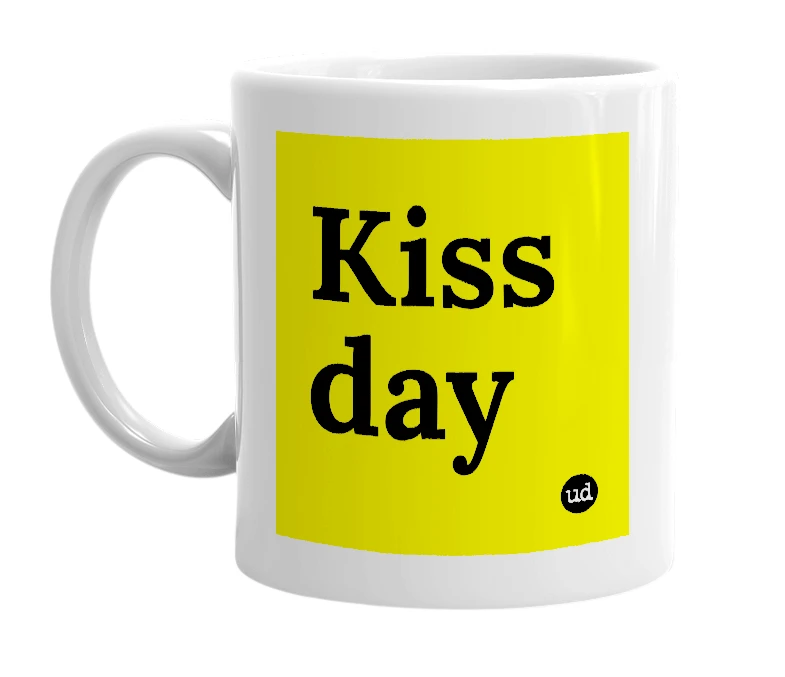 White mug with 'Kiss day' in bold black letters