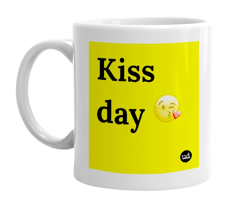 White mug with 'Kiss day 😘' in bold black letters