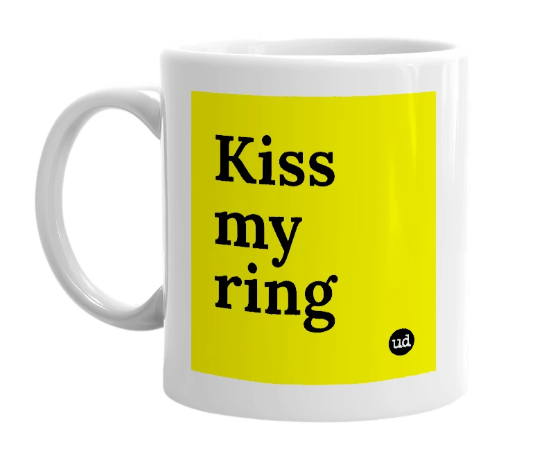 White mug with 'Kiss my ring' in bold black letters