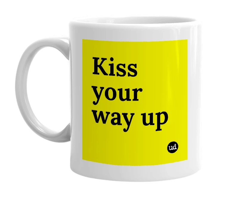 White mug with 'Kiss your way up' in bold black letters