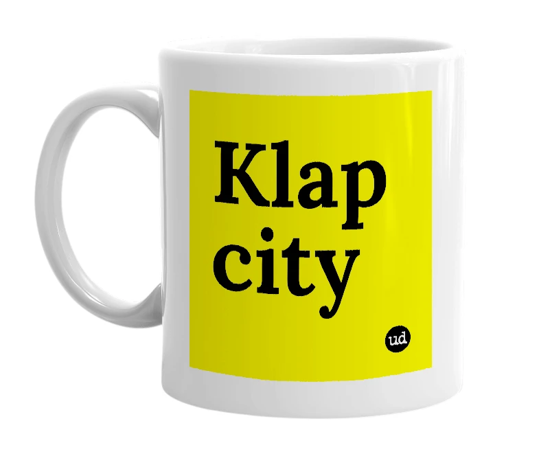 White mug with 'Klap city' in bold black letters