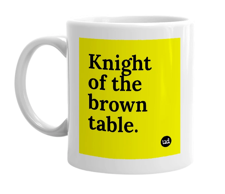 White mug with 'Knight of the brown table.' in bold black letters