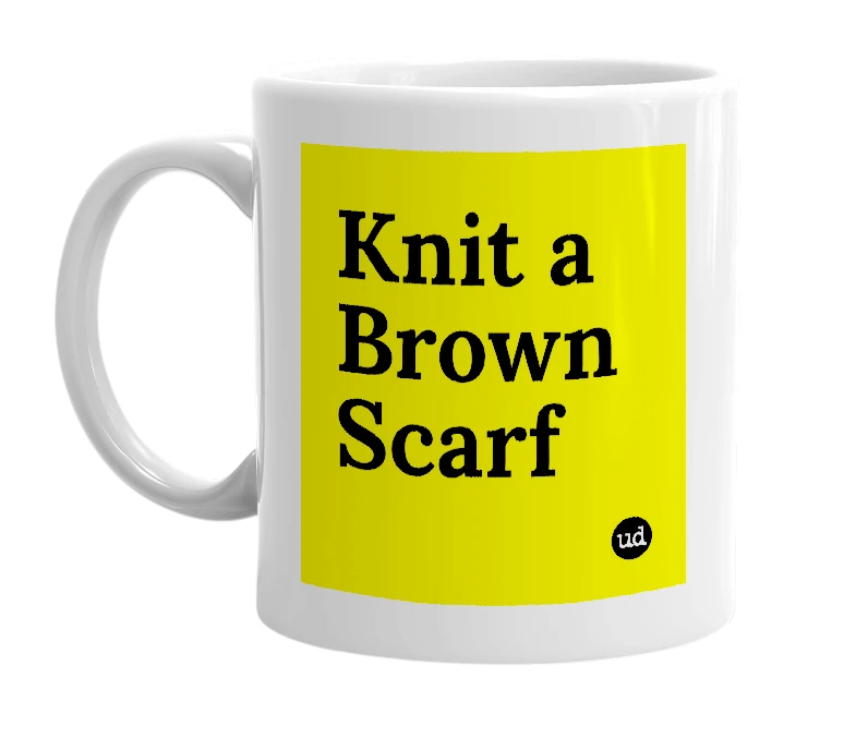 White mug with 'Knit a Brown Scarf' in bold black letters