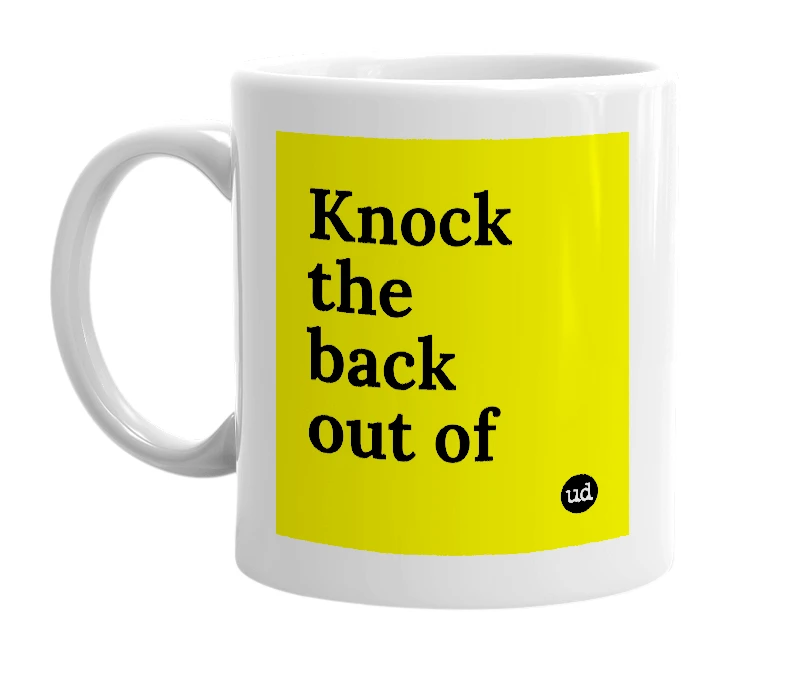 White mug with 'Knock the back out of' in bold black letters