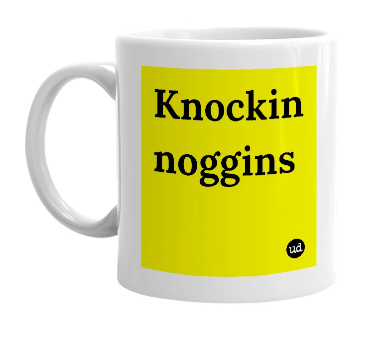 White mug with 'Knockin noggins' in bold black letters