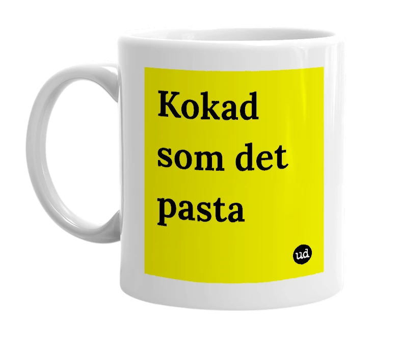 White mug with 'Kokad som det pasta' in bold black letters