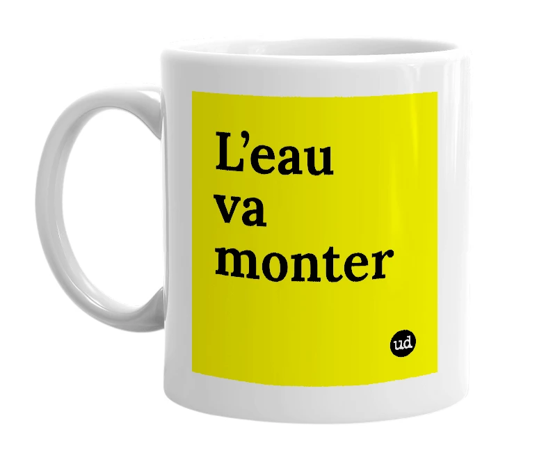 White mug with 'L’eau va monter' in bold black letters
