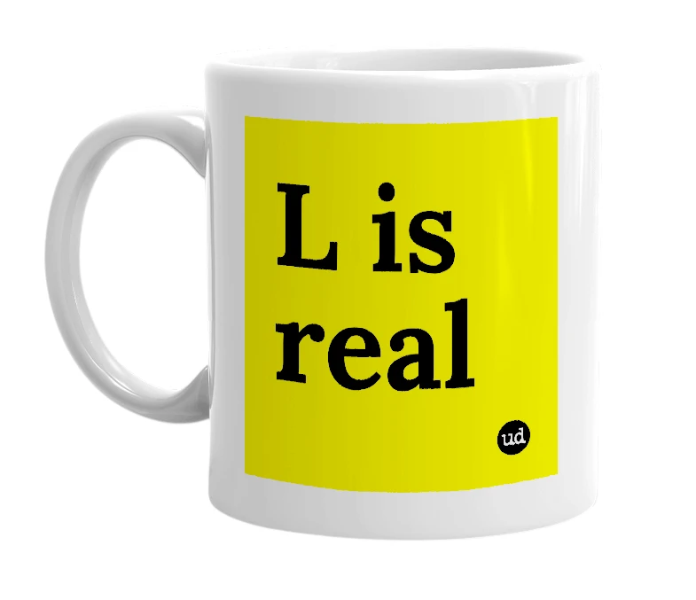 White mug with 'L is real' in bold black letters