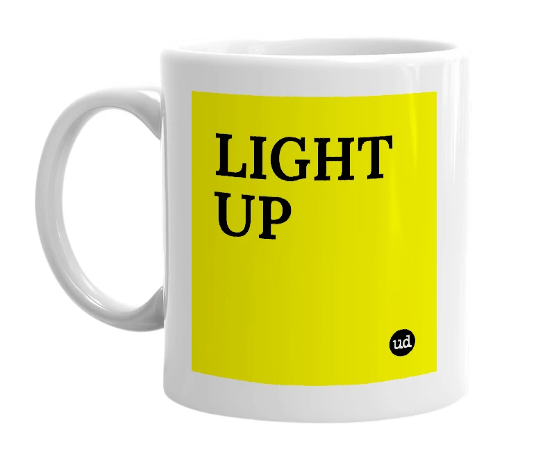 White mug with 'LIGHT UP' in bold black letters