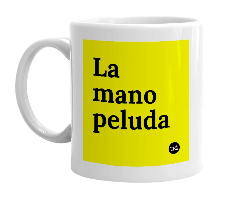 White mug with 'La mano peluda' in bold black letters