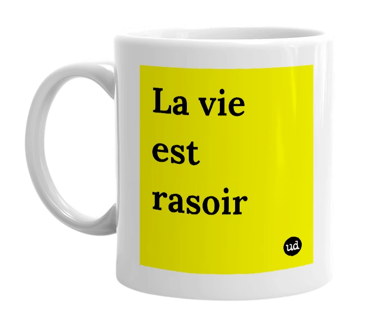 White mug with 'La vie est rasoir' in bold black letters