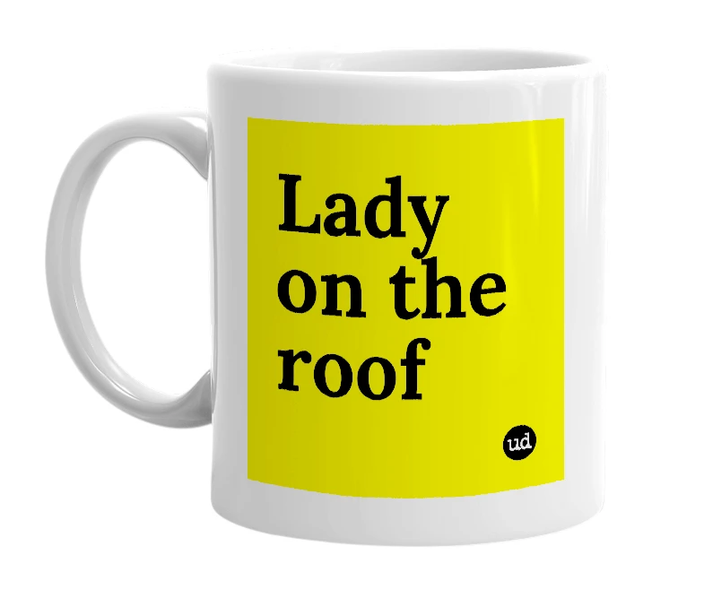 White mug with 'Lady on the roof' in bold black letters