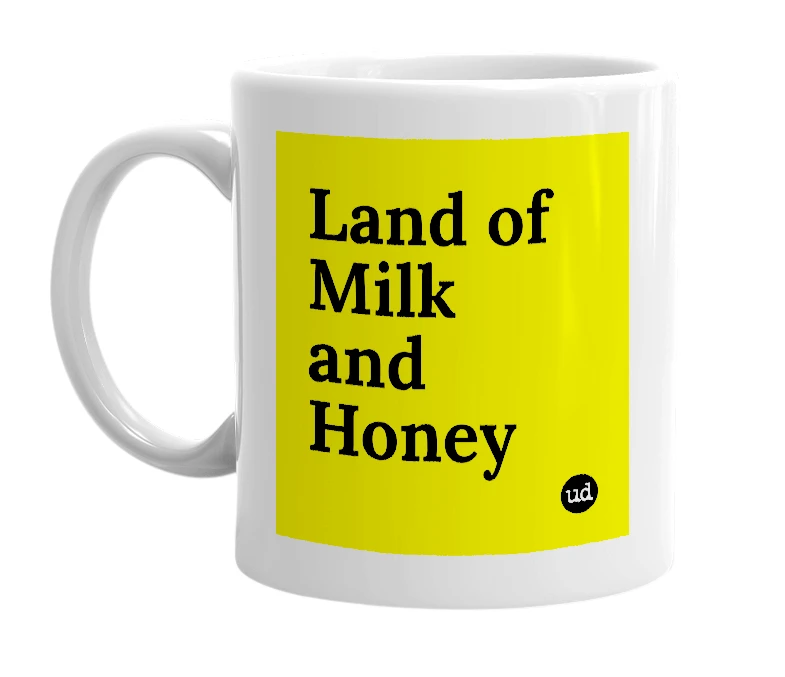 White mug with 'Land of Milk and Honey' in bold black letters