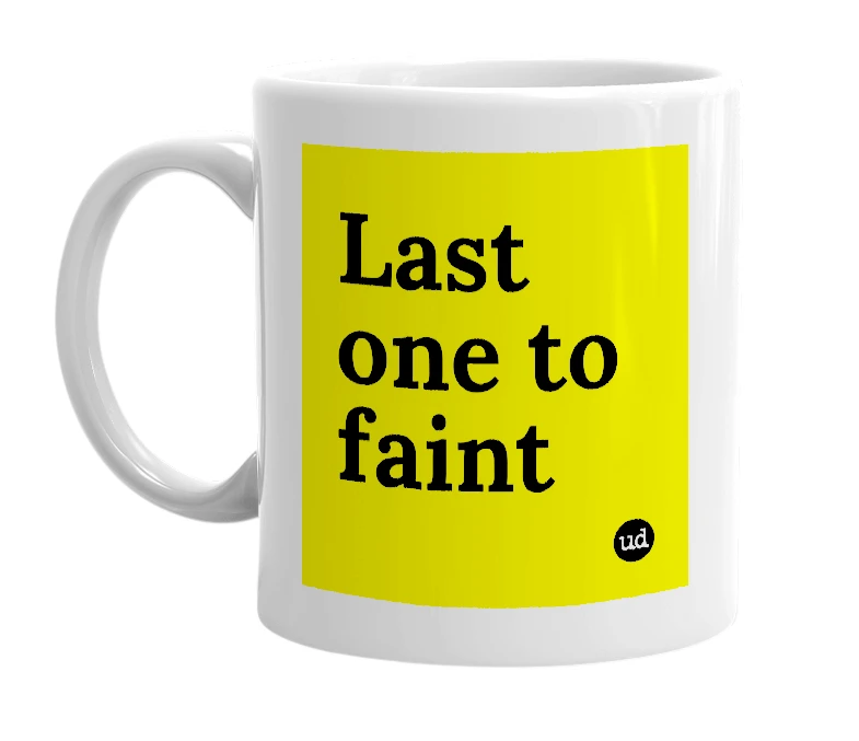 White mug with 'Last one to faint' in bold black letters