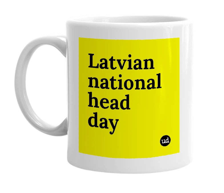 White mug with 'Latvian national head day' in bold black letters