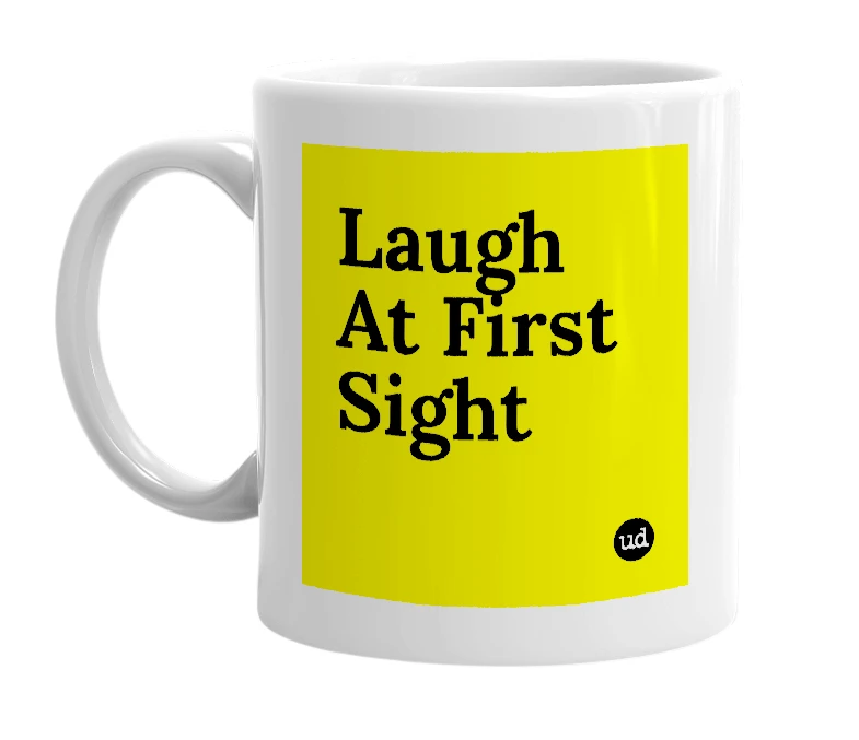 White mug with 'Laugh At First Sight' in bold black letters