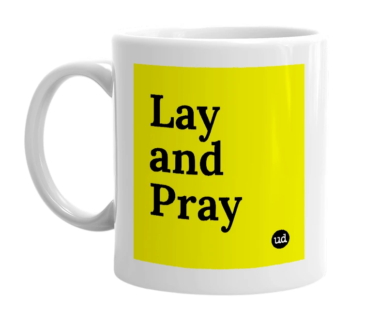 White mug with 'Lay and Pray' in bold black letters