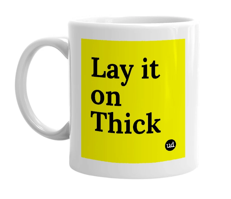 White mug with 'Lay it on Thick' in bold black letters