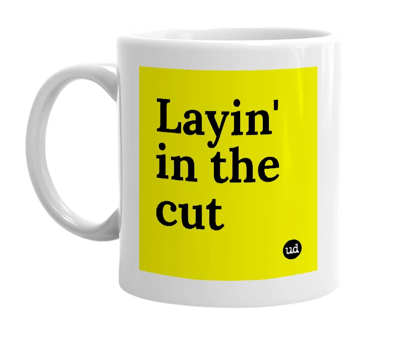 White mug with 'Layin' in the cut' in bold black letters