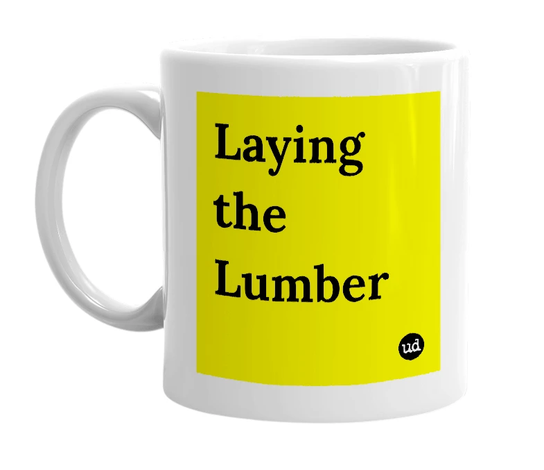 White mug with 'Laying the Lumber' in bold black letters