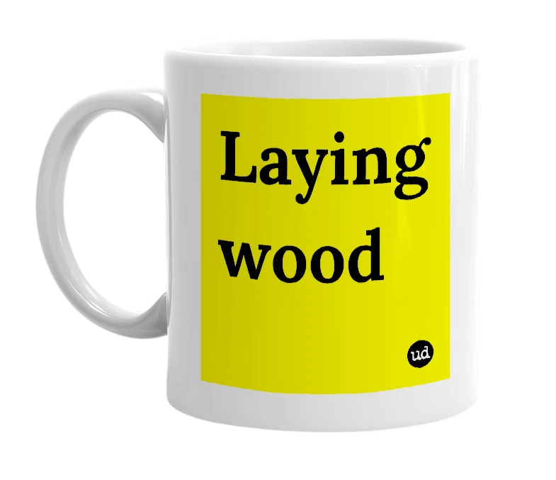 White mug with 'Laying wood' in bold black letters
