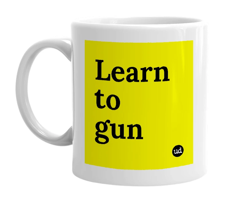 White mug with 'Learn to gun' in bold black letters