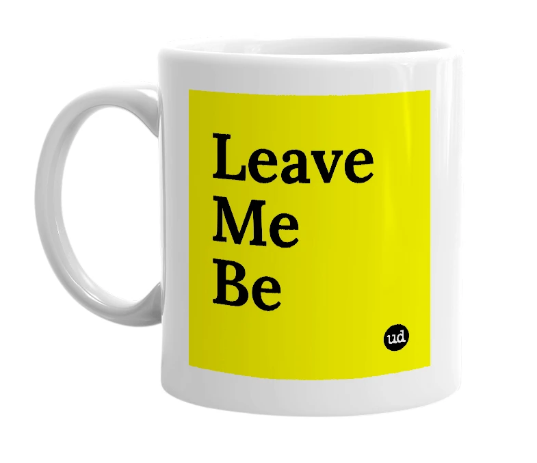 White mug with 'Leave Me Be' in bold black letters
