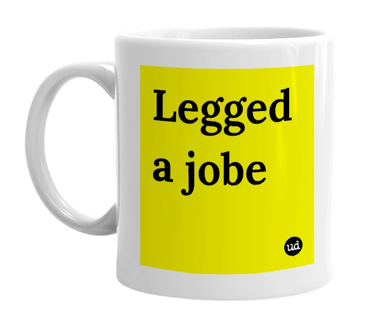 White mug with 'Legged a jobe' in bold black letters