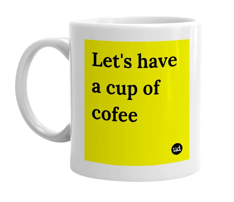 White mug with 'Let's have a cup of cofee' in bold black letters