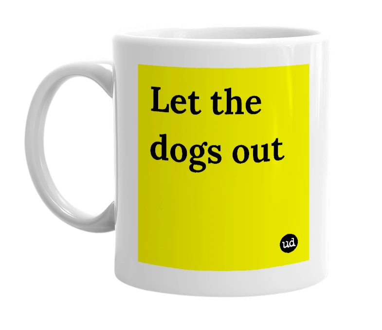 White mug with 'Let the dogs out' in bold black letters