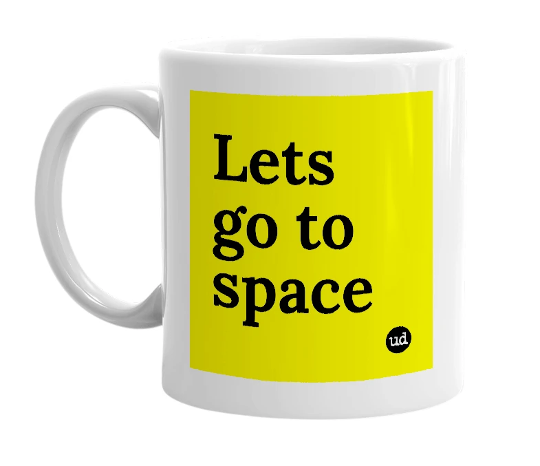 White mug with 'Lets go to space' in bold black letters
