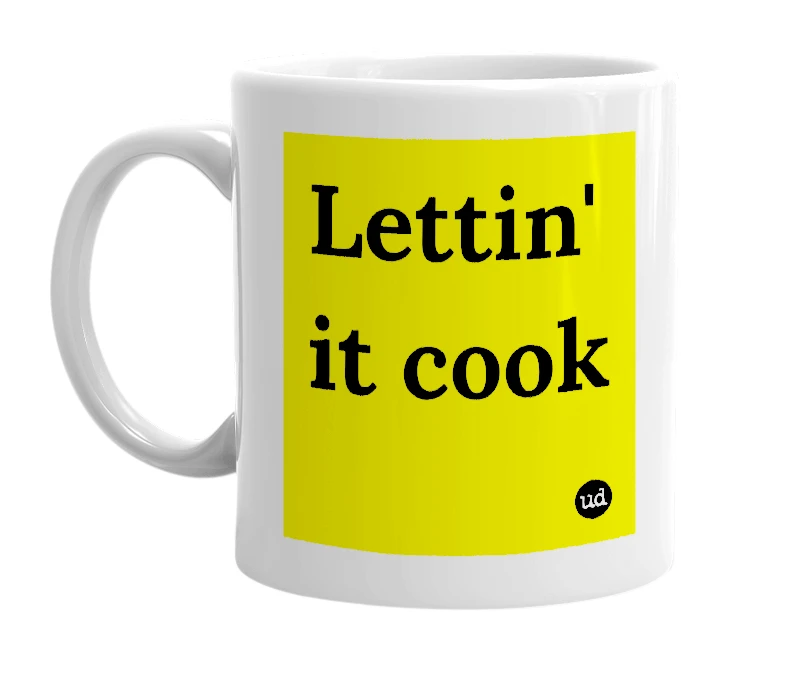 White mug with 'Lettin' it cook' in bold black letters