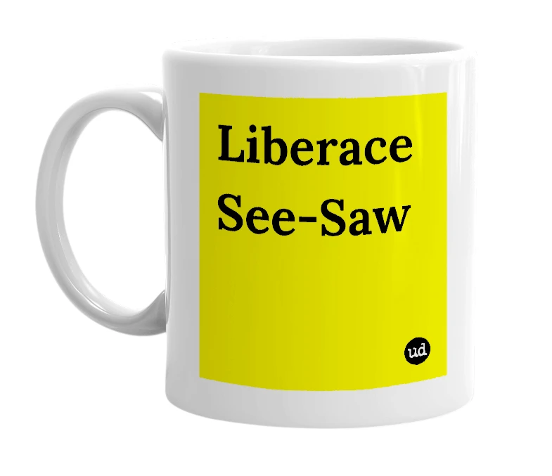 White mug with 'Liberace See-Saw' in bold black letters