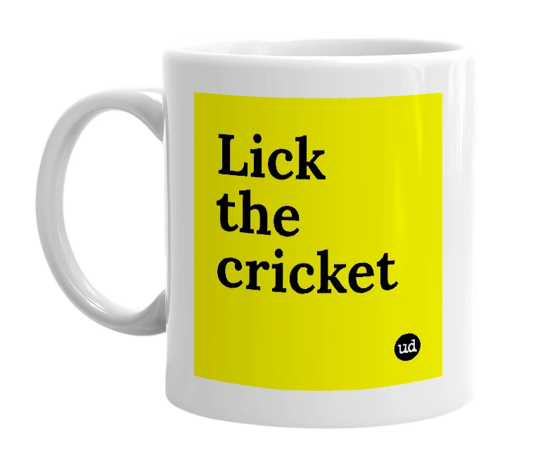 White mug with 'Lick the cricket' in bold black letters