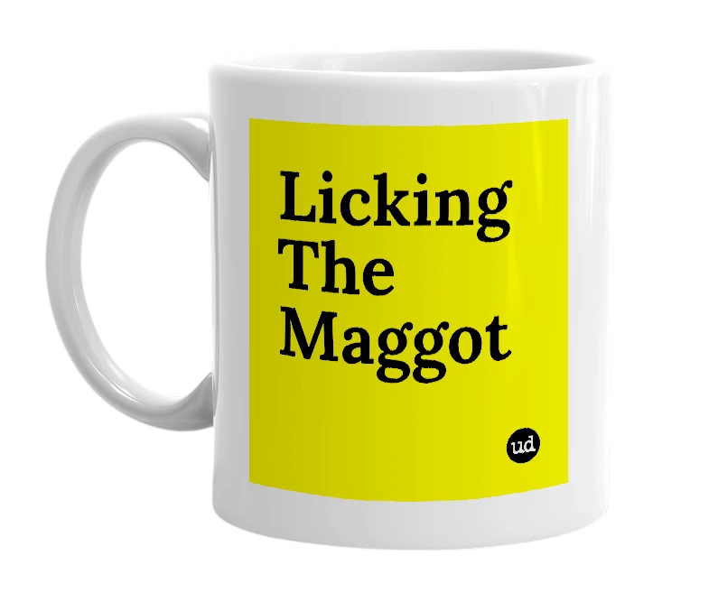 White mug with 'Licking The Maggot' in bold black letters