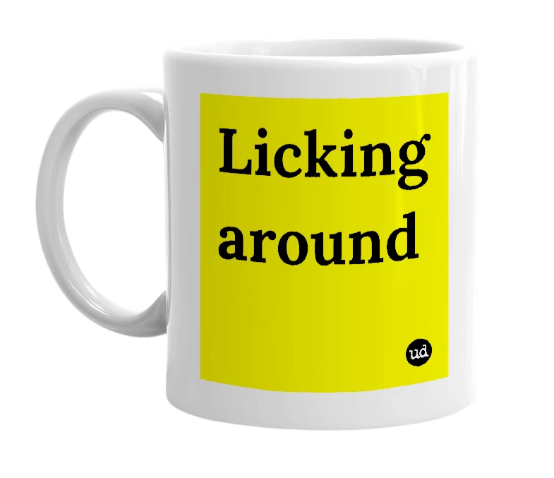 White mug with 'Licking around' in bold black letters