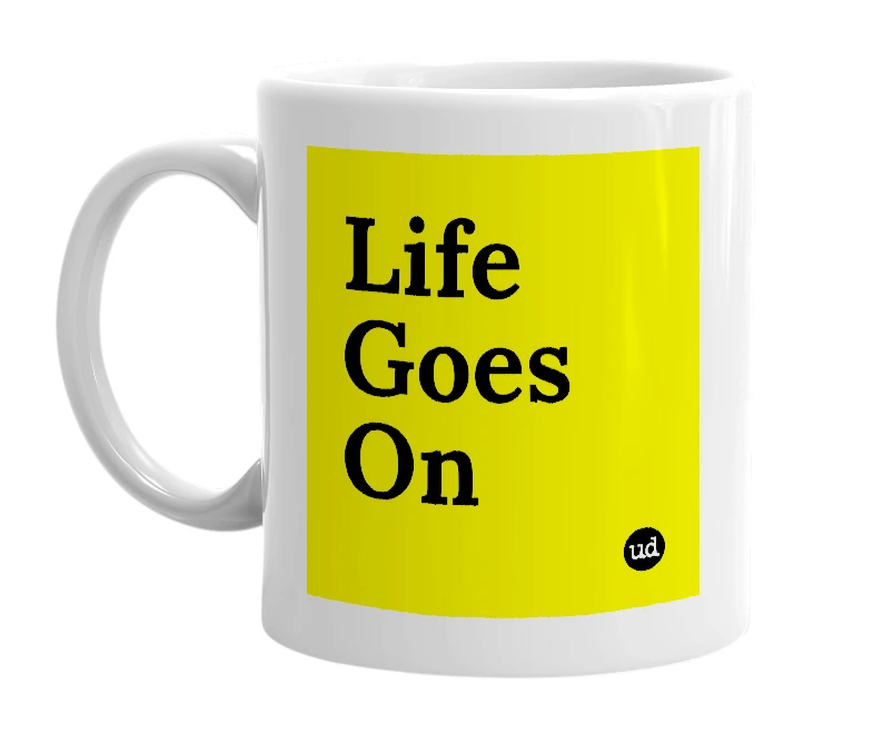 White mug with 'Life Goes On' in bold black letters