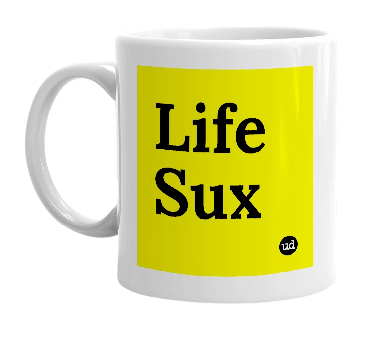 White mug with 'Life Sux' in bold black letters