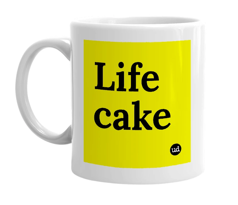 White mug with 'Life cake' in bold black letters