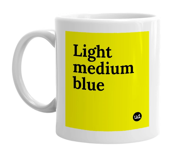 White mug with 'Light medium blue' in bold black letters