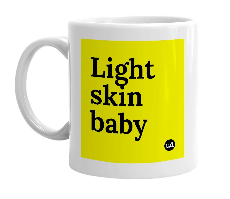 White mug with 'Light skin baby' in bold black letters