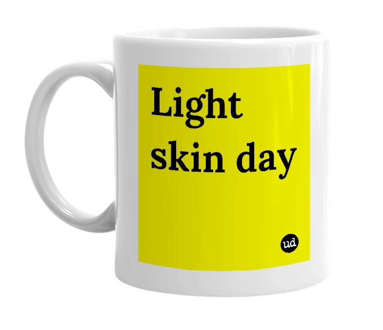 White mug with 'Light skin day' in bold black letters
