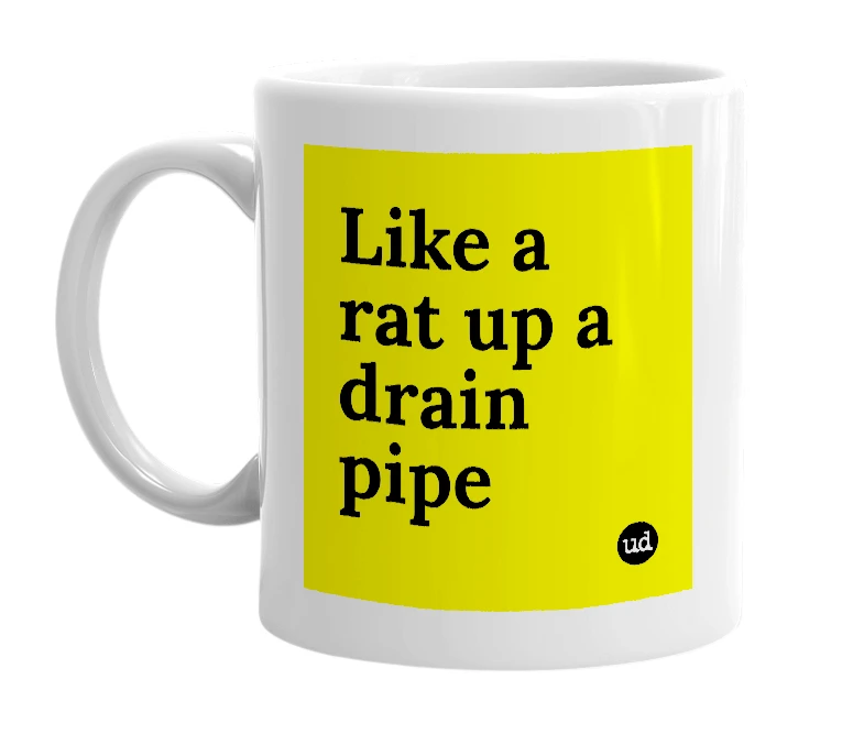 White mug with 'Like a rat up a drain pipe' in bold black letters